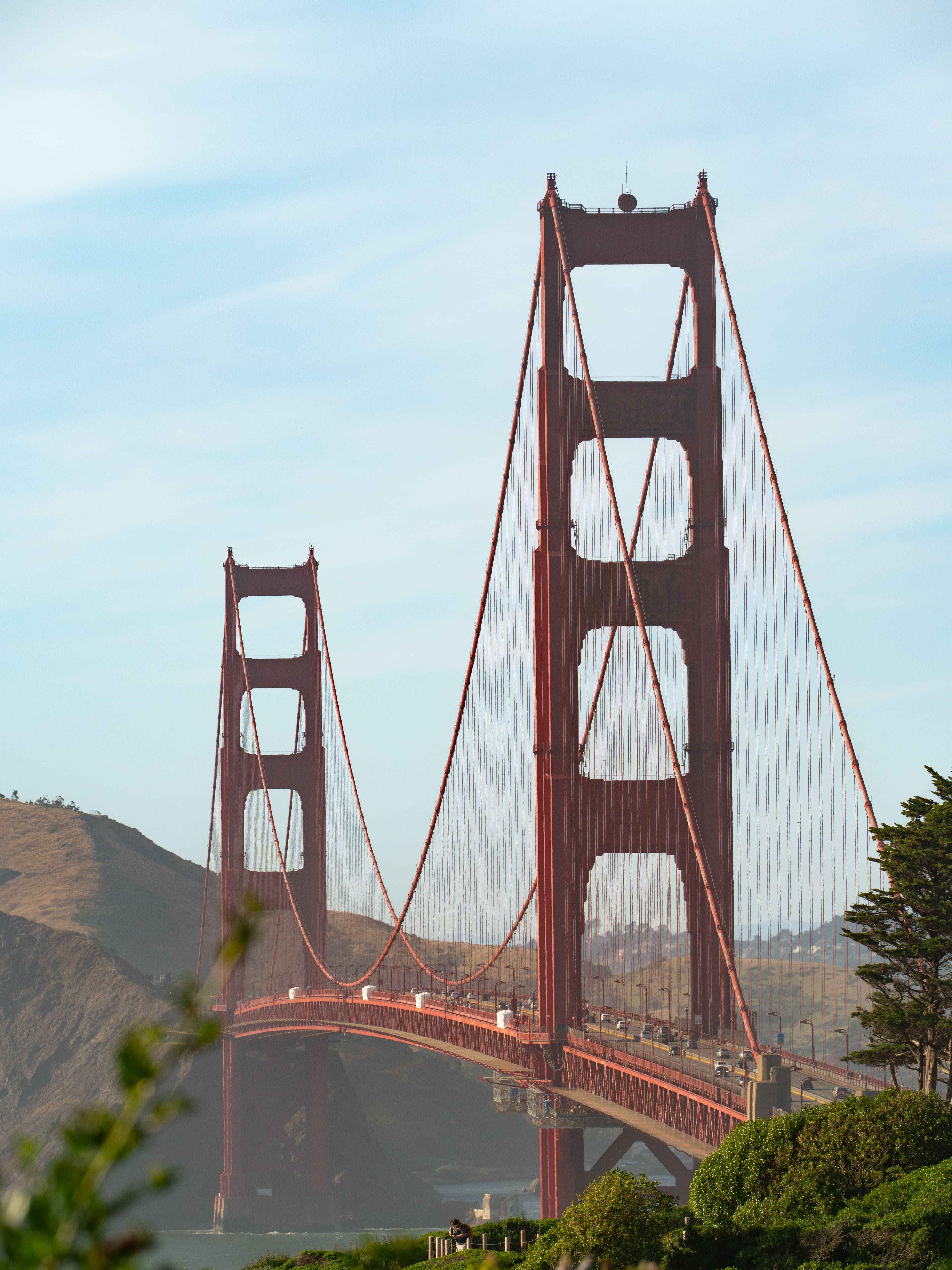 A shot of the Golden Gate Bridge the top hill across the bridge